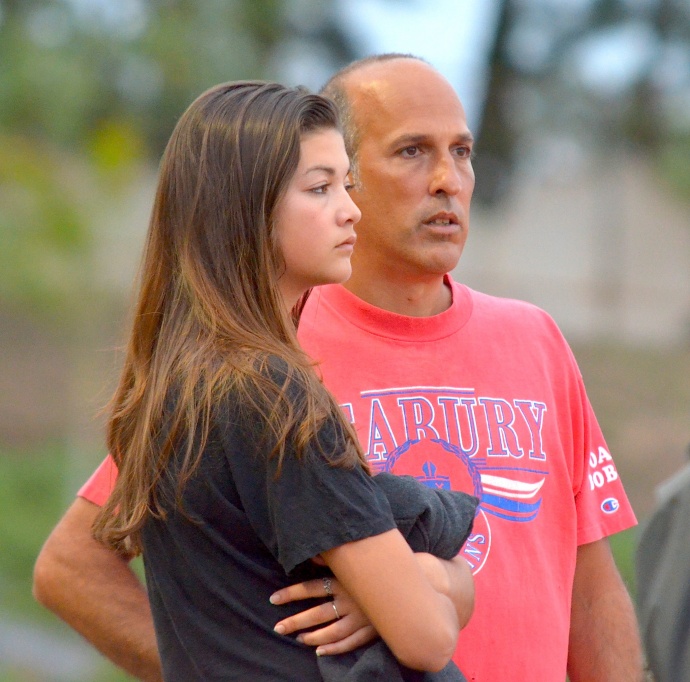 Seabury Hall head coach Bobby Grossman got a surprise visit from his daughter Haley at Friday's trials of the Yamamoto Invitational. Photo by Rodney S. Yap.
