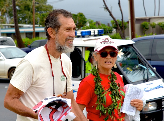 Walter Ritte (left) at Maui rally against GMOs. Photo by Rodney Yap.
