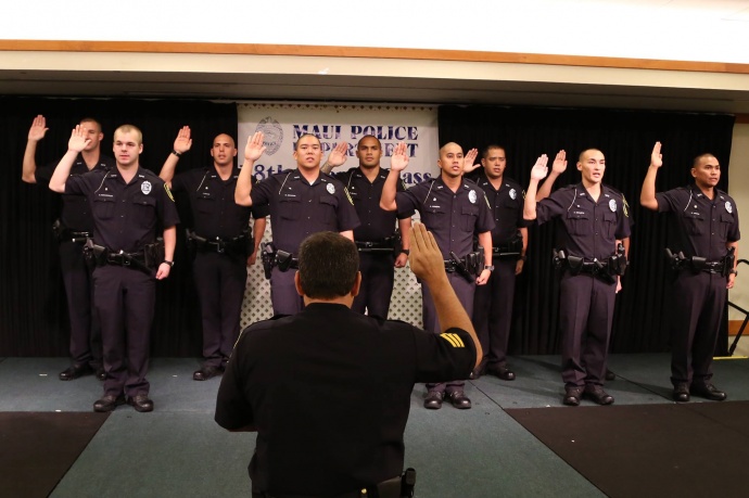 Maui Police Department's 78th Graduating Recruit Class takes an oath at the Maui Beach Hotel's Elleair Ballroom.  Photo courtesy County of Maui.