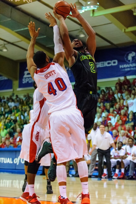 Baylor's Rico Gathers goes up hard to the glass against Dayton's defense Tuesday at the Lahaina Civic Center. Photo by Denton Johnson.