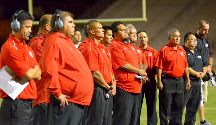 The Lahainaluna High School coaching staff during the school's alma mater earlier this year. File photo by Rodney S. Yap.