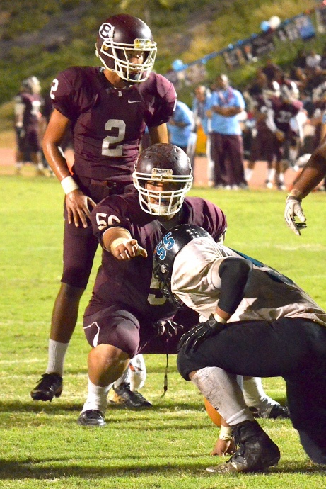 Baldwin High School's offense will be led by senior center Noah Apolo and sophomore quarterback Jonovan-Tage Akaka-Foster (2). File photo by Rodney S. Yap.