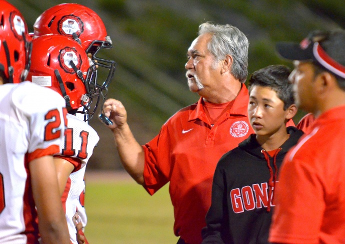 Lahainaluna co-head coach Bobby Watson talks to players during a defensive timeout earlier this year. File photo by Rodney S. Yap. 