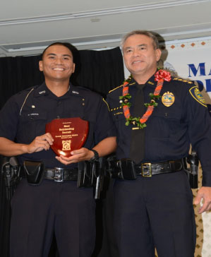 Chief Gary YABUTA presenting the Outstanding Recruit Award to Officer Christopher Visaya. Photo courtesy Maui Police.