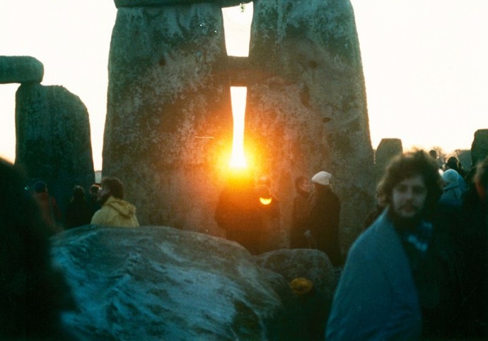 This is an image of sunrise at Stonehenge during a winter solstice in the 80s courtesy of Wikipedia, but also looks like it should be a Bob Dylan album cover.