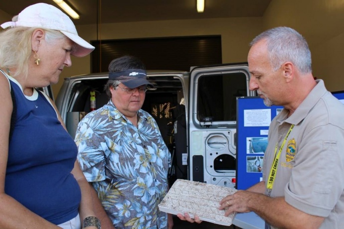 Maui Police Evidence Specialist, Tony Earles shows visitors some of the tools utilized by the criminal investigation division when compiling evidence.  The new station has its own evidence room, which will serve as a backup for the Wailuku Police Station.  Photo by Wendy Osher