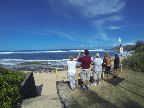Spectators attempt to take pictures of the heavy surf at Ho’okipa that spoiled Maui ocean athletes last week. File photo by Riley Yap. 