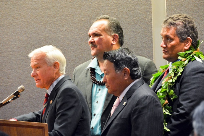 Oahu Mayor Kirk Caldwell speaks as Mayors Bernard Carvalho (Kauai), Alan Arakawa and Billy Kenoi (Hawaii) look on during a joint session of the Senate Ways and Means Committee and the House Finance Committee on Oahu. (1.15.14) Photo courtesy County of Maui.