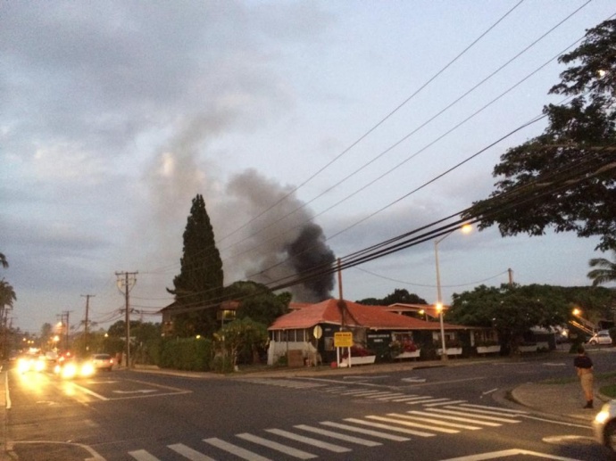 This photo was taken from the ABC Store on Lower Honoapiʻilani Road across the street from the Sunset Terrace apartments where smoke could be seen coming from the complex. Photo courtesy Sam Florez.