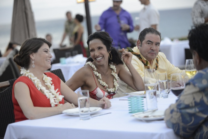 Top Chef judges, from left, Gail Simmons, Padma Laskshmi, and Emeril Lagasse enjoy a moment during filming at Merriman's Kapalua on Maui. Photo credit: Bravo Photo.