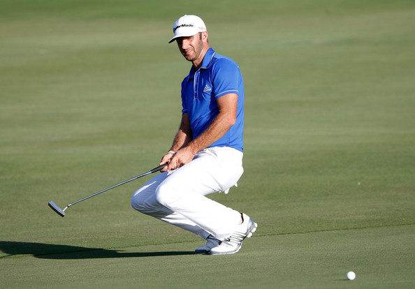 Dustin Johnson reacts to a putt on the 18th green during round three of the Hyundai Tournament of Champions at the Plantation Course on Sunday, Jan, 5. Photo by  Tom Pennington/Getty Images.