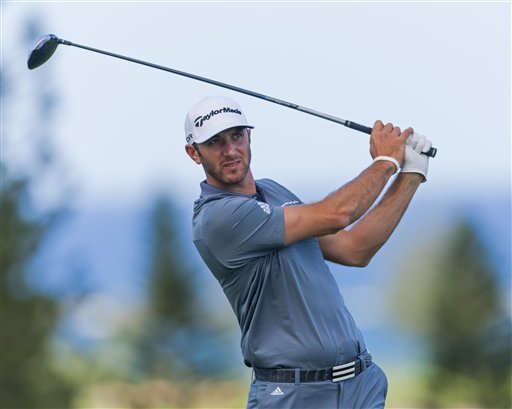 Dustin Johnson follows his drive off the ninth tee during the second round of the Tournament of Champions golf tournament, Saturday, Jan. 4, in Kapalua. Photo by Marco Garcia/AP Photo.