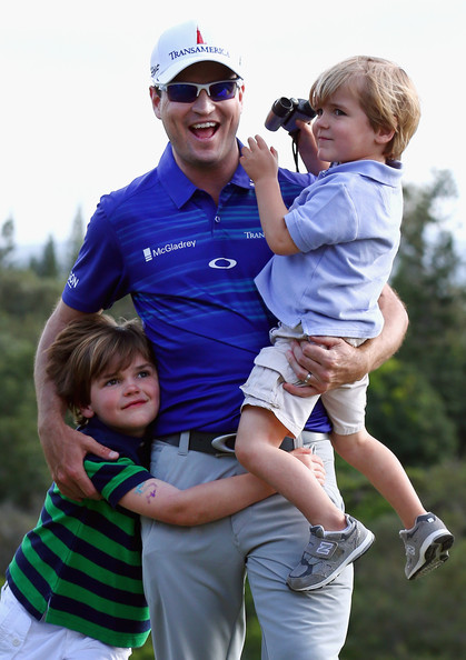 Zach Johnson celebrates with his sons, Will (L) and Wyatt (R), after winning the Hyundai Tournament of Champions at the Plantation Course at Kapalua on Monday, Jan. 6. Photo by Tom Pennington/Getty Images.