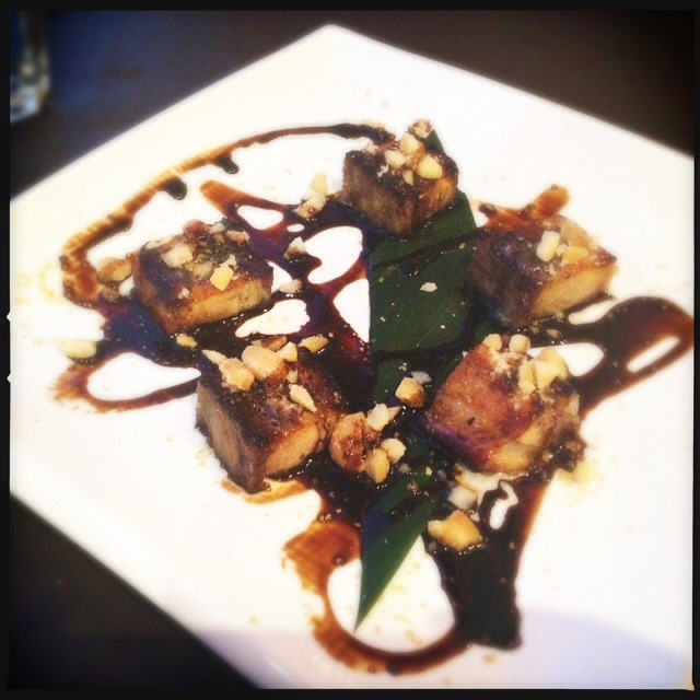 The Braised Pork Belly comes with some heavy-handed balsamic reduction. Photo by Vanessa Wolf 