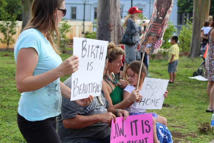 A group of supporters of midwives on Maui joined in a demonstration supporting their profession in solidarity against SB2569 during at a gathering at the state building in Wailuku. Photo by Wendy Osher.
