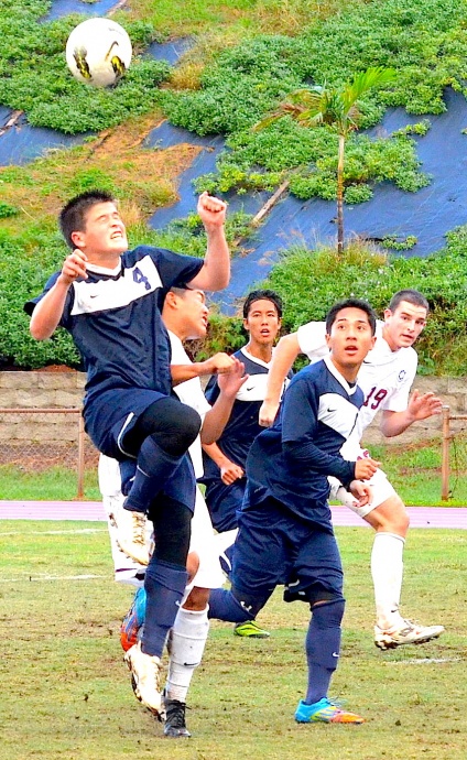 Kamehameha Maui's Micah Alo (4), shown here going up for a header in a match against Baldwin earlier this year, scored the Warriors' second goal in their 2-0 win over Mililani on Wednesday. File photo by Rodney S. Yap.