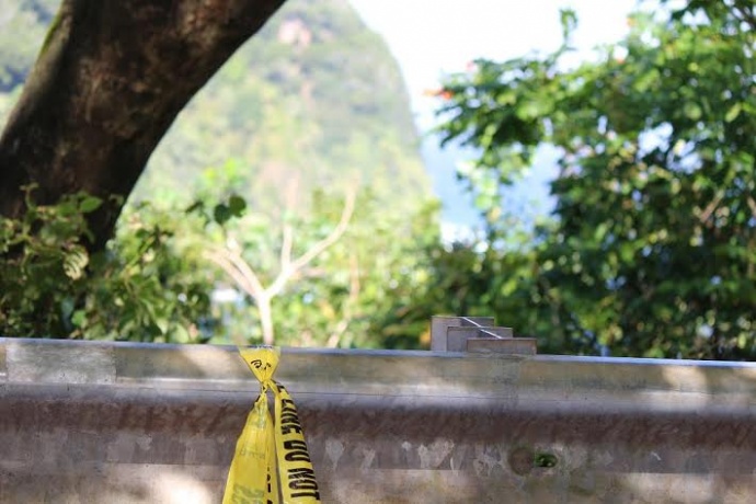 Police tape at cliff overlooking Honomanū Bay. Photo 2/15/14, by Wendy Osher.