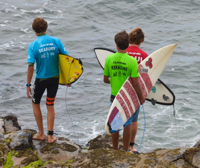 Competitors in the boys shortboard semifinals prepare to get wet at Ho'okipa Beach Park on Saturday. Photo by Rodney S. Yap.