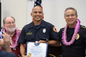 Governor Neil Abercrombie (left), Firefighter II Modesto Jacinto Jr. (middle), and Maui Police Chief Gary Yabuta (right). Photo by Wendy Osher.