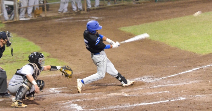 Maui High's Kao Mindoro gets one of his two hits against Baldwin Friday at Maehara Stadium. Photo by Rodney S. Yap.