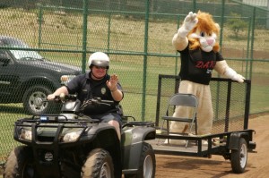 DARE Officer Tim Hodgens and Darren the DARE Lion. Photo courtesy Maui Police.