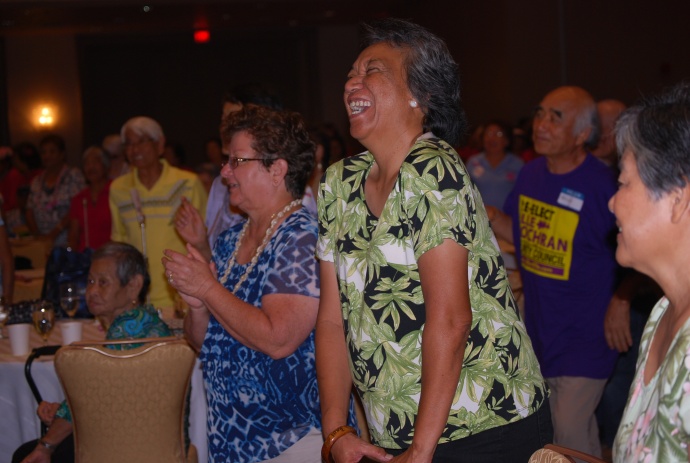 Left to right Agnes Groff, Kaui Alo-Palau and others enjoy the song Burn'n Love performed by Darren Lee as Elvis at the Maui Senior Fair. Courtesy file photo (2014).