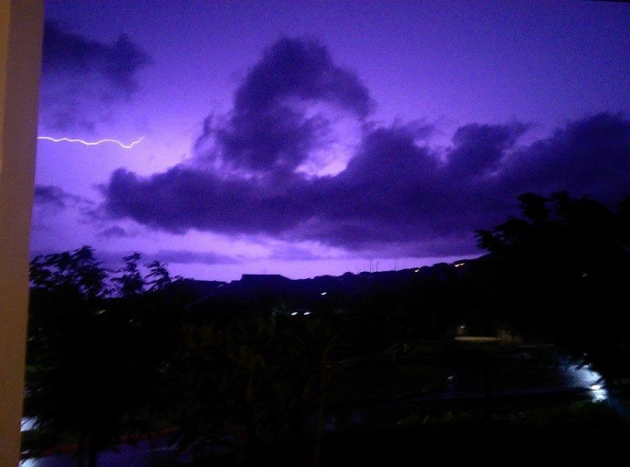 Midnight lightning from Wailuku by Gregg Leion.