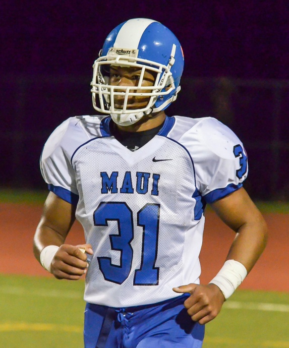Maui High's Hanisi Lotulelei scored two touchdowns for the Sabers Friday against King Kekaulike. Photob y Rodney S. Yap. 