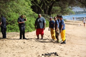 Photos By KEVIN J. OLSON. Suspected piece of unexploded ordnance in North Kihei.