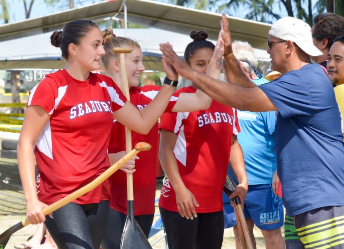 Seabury Hall girls are congratulated after their race Saturday. Photo by Rodney S. Yap.