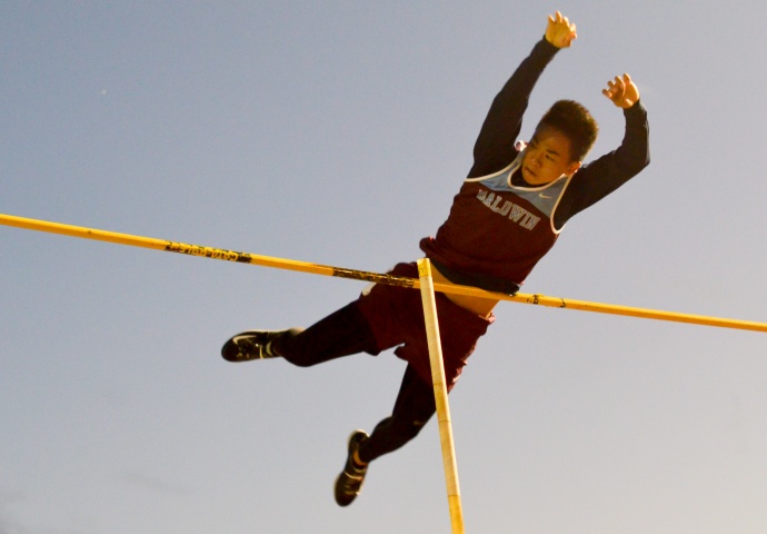 Baldwin High School's Kainoa Tom clears 15 feet on this attempt Friday at War Memorial Stadium. Photo by Rodney S. Yap.