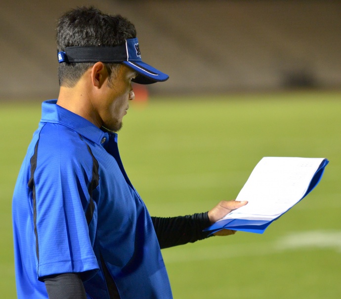 Maui High football coach David Bui helped the Sabers return to the state football tournament last year for the first time since 2000. File photo by Rodney S. Yap.