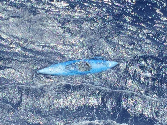 An unmanned and adrift kayak was discovered by an MH-65 Dolphin helicopter crew approximately 12 miles southwest of La’au Point, Molokai, March 29, 2015. There were no contents aboard, no discernible markings and no signs of distress in the immediate area. (Coast Guard courtesy photo)