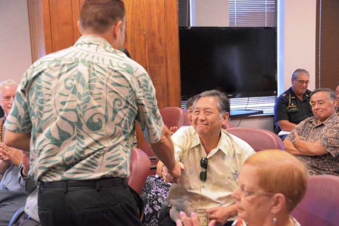 Budget Chair Hokama receives budget from Director Sandy Baz. Photo courtesy County of Maui, Office of the Mayor.