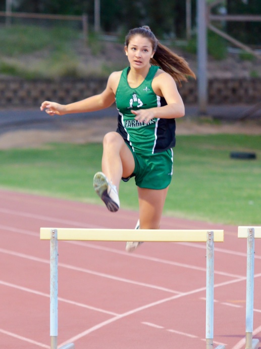 Molokai hurdler Alex Simon won the girls 300 hurdles in her first meet of the season. Simon was timed in 50.90 seconds. Photo by Rodney S. Yap.