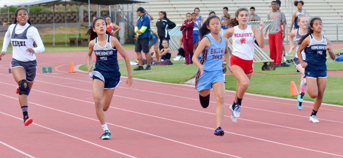 Baldwin's Mindy Kimura and Kamehameha Maui's Ani Nitta battle in their heat of the girls junior varsity 100-meter dash Friday at Yamamoto Track & Field Facility.  Kimura nipped Nitta, 13.35 seconds to 13.36. Also pictured are Kihei Charter's Camryn Henry (14.09),  Seabury Hall's Jenna Carvalho (13.83) and Kamehameha Maui's Brylee Carillo (14.35).  Photo by Rodney S. Yap.