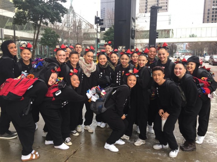 The Hawaii All-Stars Restricted Level 5 team pose outside the train station en route to its competition on Sunday, March 2. Photo courtesy of Hawaii All-Stars.