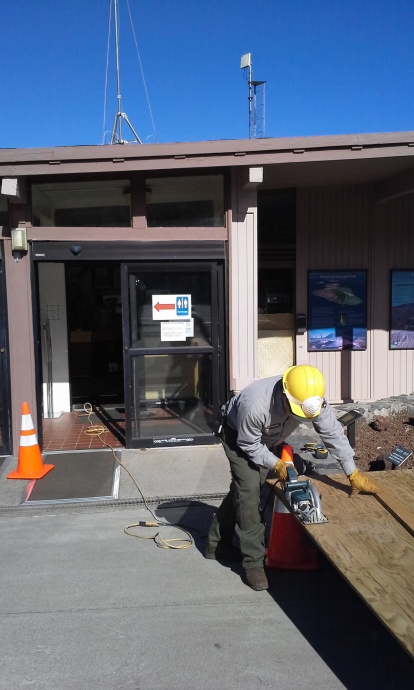 Shaping the plywood base. Photo courtesy Haleakalā National Park.
