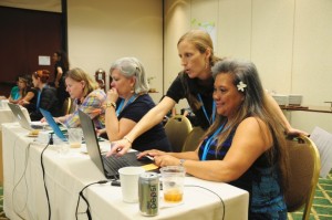 Conference Instructor Marybeth Baldwin assists teachers Lila Parong (Prince Jonah Kalanianoaole Elementary & Intermediate School) with Tourbuilder, a software program during one of the teacher professional development workshops. Courtesy photo.