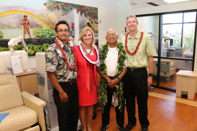 Rudy Marilla, vice president of clinic operations; Mary Ann Barnes, RN, president of Kaiser Permanente Hawaii and Rainbow Dialysis; Kahu Earl Kukahiko; and Geoffrey Sewell, MD, president and executive medical director of Hawaii Permanente Medical Group, at the blessing of Lahaina Rainbow Dialysis Center on April 30. Courtesy photo.
