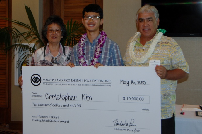 (left to right): Karen Uno, board director for Takitani Foundation; Christopher Kim, Mamoru Takitani Distinguished Student Scholarship of Maui High School; and Anthony Takitani, chair of the board for Hawaiian Host, Inc.