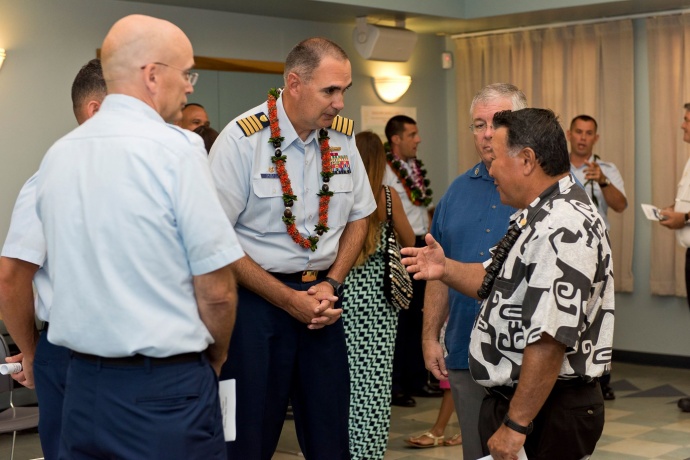 Mayor Alan Arakawa chats with Captain Shannon Gilreath Commander, Coast Guard Sector Honolulu before the start of the Change of Command Ceremony. (6.8.2015) — with Don Couch.