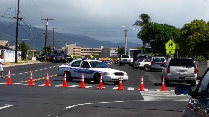 Maui police conduct investigation into moped fatality in Kahului. Photo by Wendy Osher.