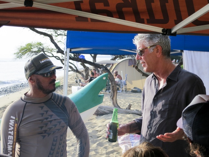 Maui Lifeguard/waterman Archie Kalepa talks with Tony on a beach on the west side of Maui.  Copyright:(c) 2015 Cable News Network. A Time Warner Company. All Rights Reserved. Used with express consent for Pacific Media Group/ Maui Now.
