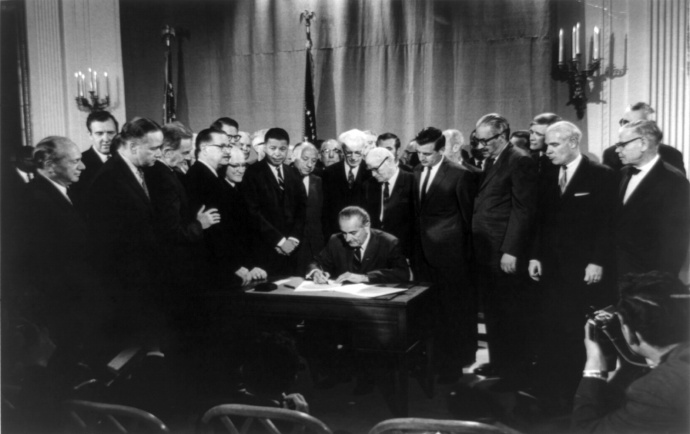 President Lyndon Johnson signing fair housing bill. Photo credit googleimages.