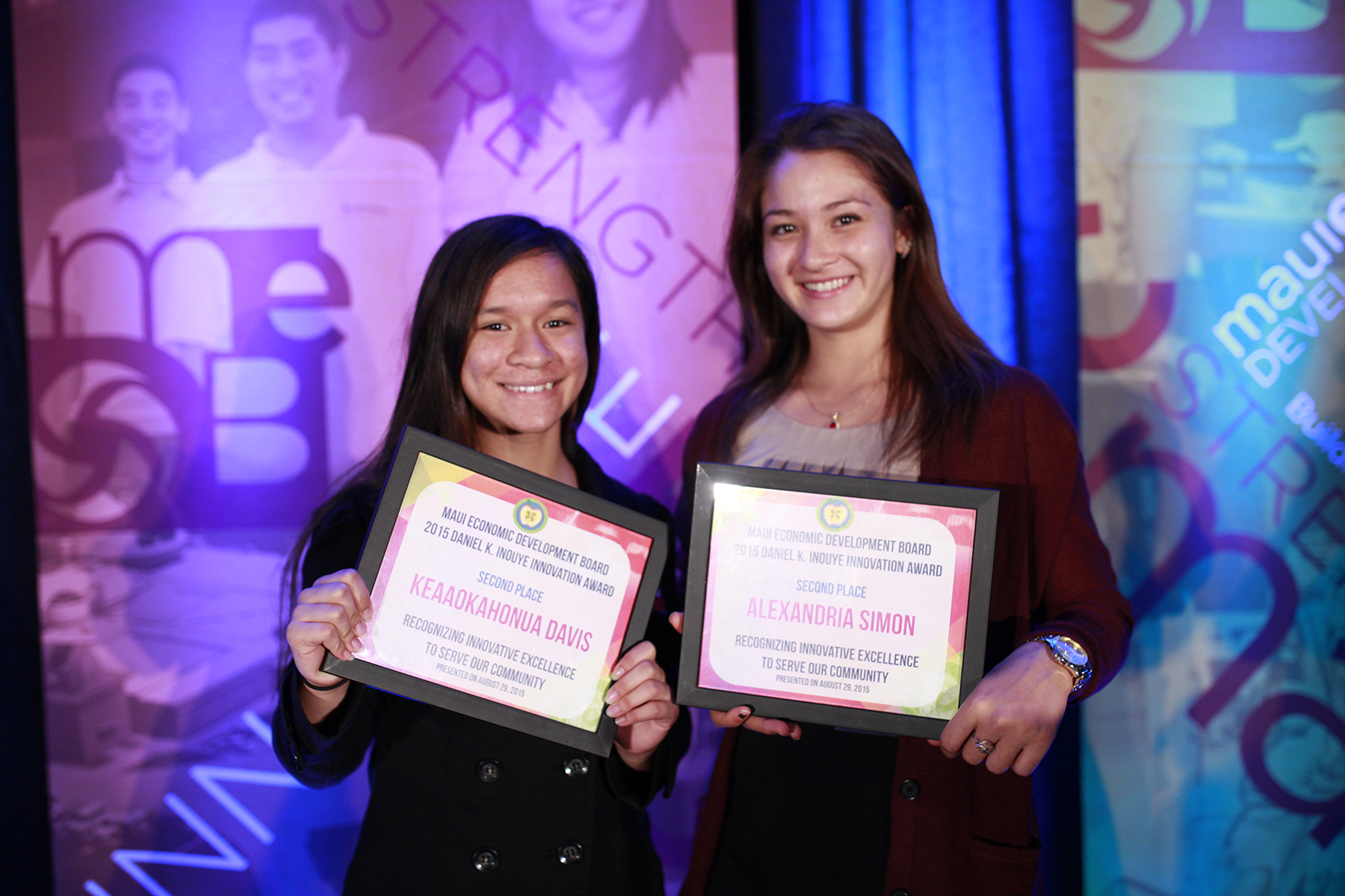 Second place honors went to the student team of Amber “Momi” Afelin (right), Ke‘aokahonua Davis, and Alexandria Simon from Moloka‘i High School for their project, “Investigating Agar Extraction from Gracilaria salicornia.” MEDB photo.