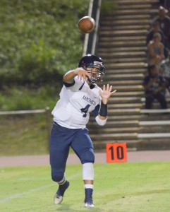 Kamehameha Maui quarterback Kainoa Sanchez throws a flat pass in the first half Saturday. Photo by Rodney S. Yap.