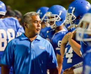Maui High School head coach Keith Shirota talks to one of his players during the first half Friday against Baldwin. Photo by Rodney S. Yap.