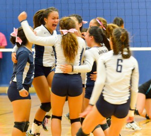 Kamehameha Maui girls volleyball team celebrates after beating King Kekaulike in four sets Friday. Photo by Rodney S. Yap.