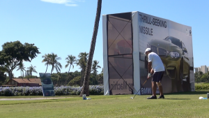 A player tees off on Kāʻanapali Golf Course for the BMW Golf Challenge. Photo by Kiaora Bohlool.